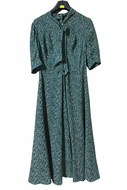 Abito vintage sartoriale in seta con fantasia verde, nero e bianco e fiocco al collo